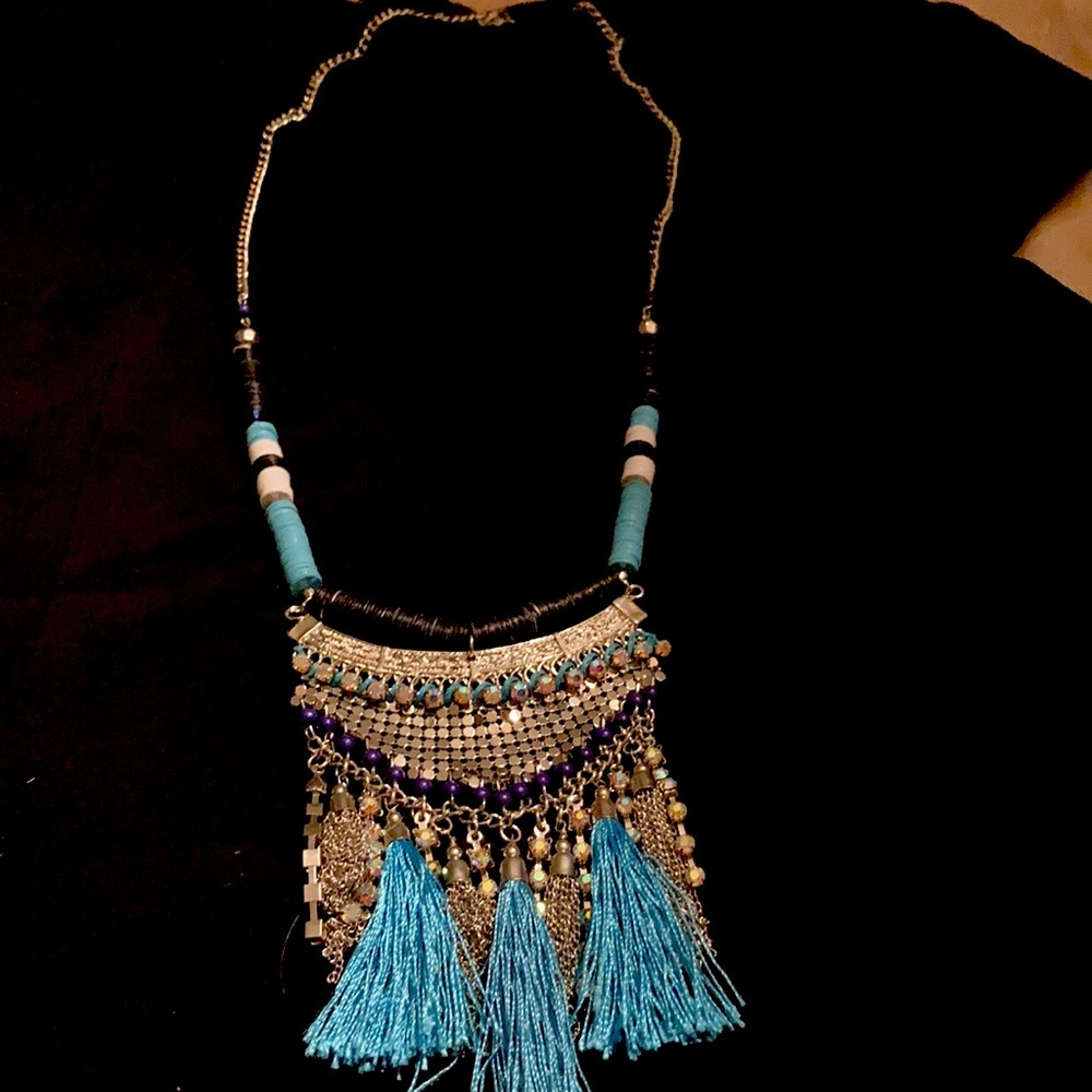 Long turquoise color with black beading